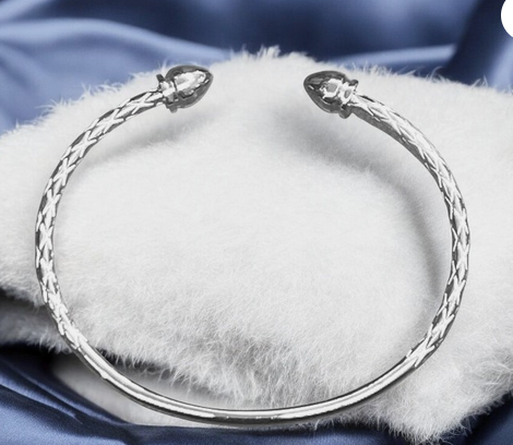 Sterling Silver plated steel West Indian Bangle ( 11.7 grams) fits 7 1/2 inch