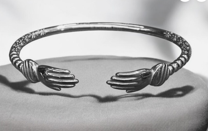 Sterling Silver plated steel West Indian Bangle ( 13.7 grams) hand