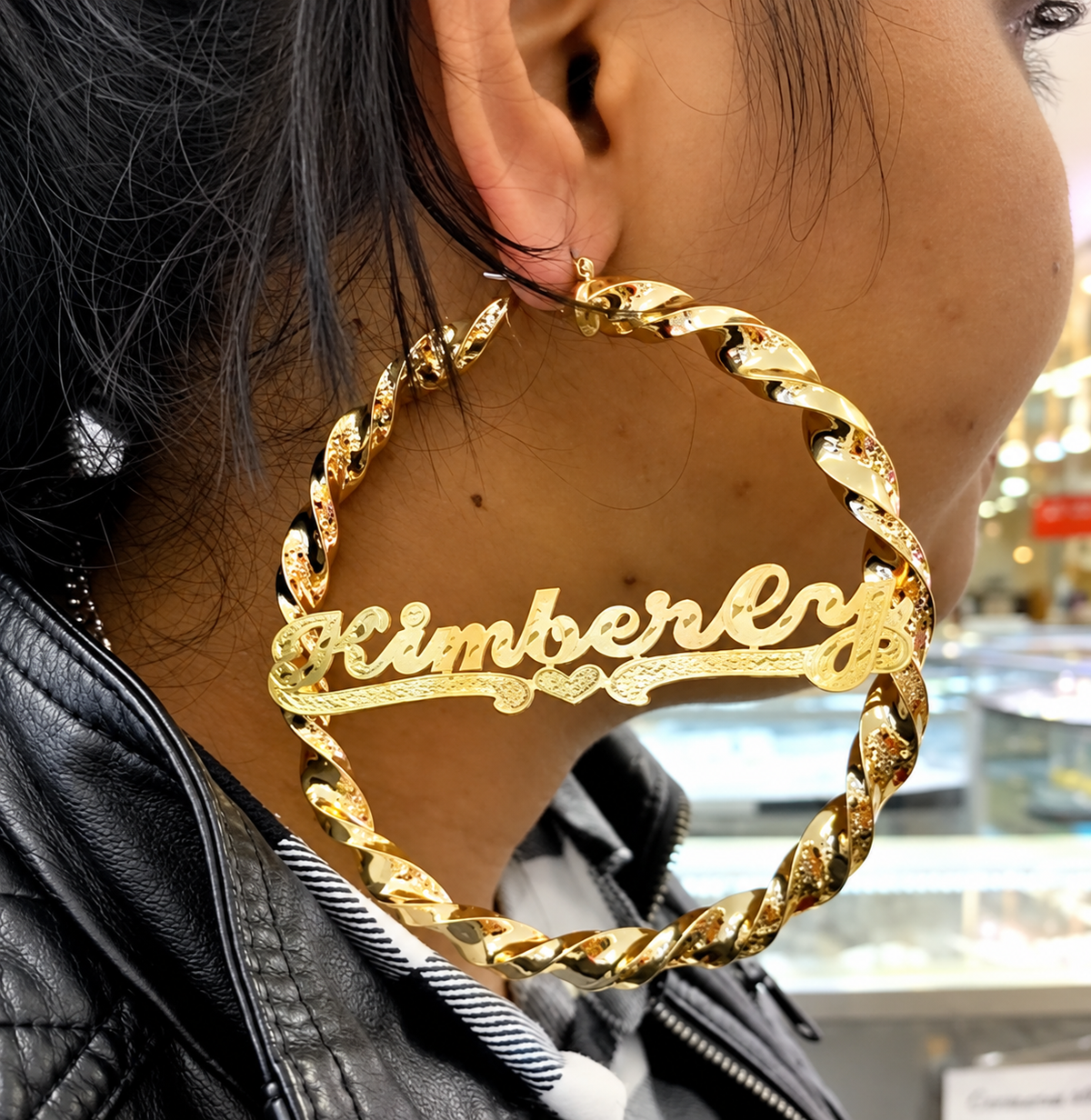 Shop 4 inch jumbo personalized name hoop earrings featuring a gold twisty bamboo design. Customize with any name up to 9 letters. Made to order.