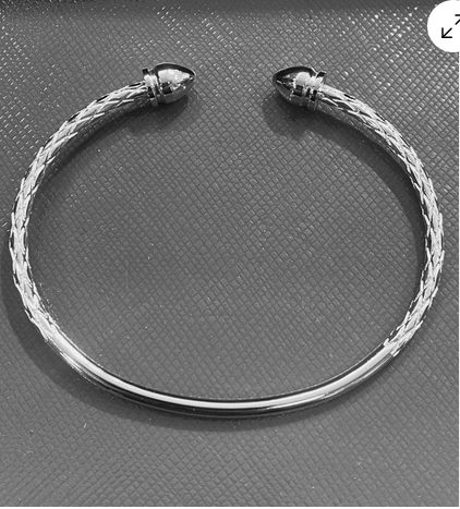 Pointy Ends Sterling Silver plated steel West Indian Bangle ( 11.7 grams)